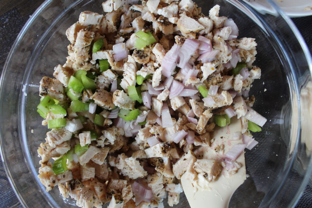 Roasted chicken is mixed with diced shallots and celery in my favorite chicken salad recipe.