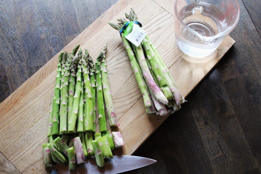 Spring asparagus spears being prepared for roasting