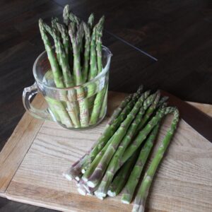 Cut spring asparagus is prepped for quick and delicious roasted asparagus recipe